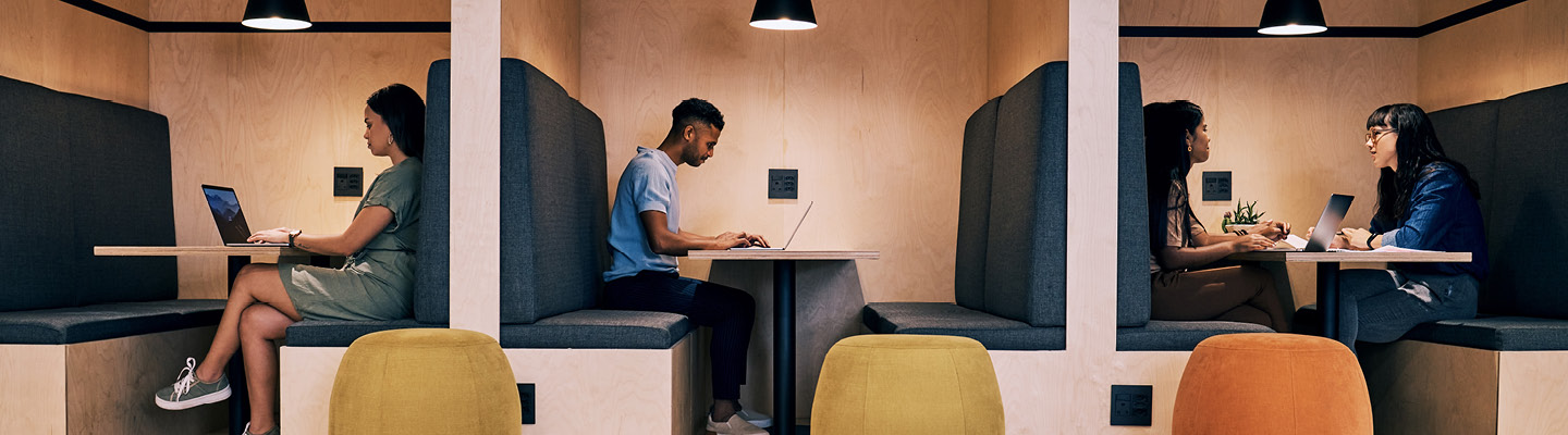 People working in an office space to illustrate indoor environmental quality